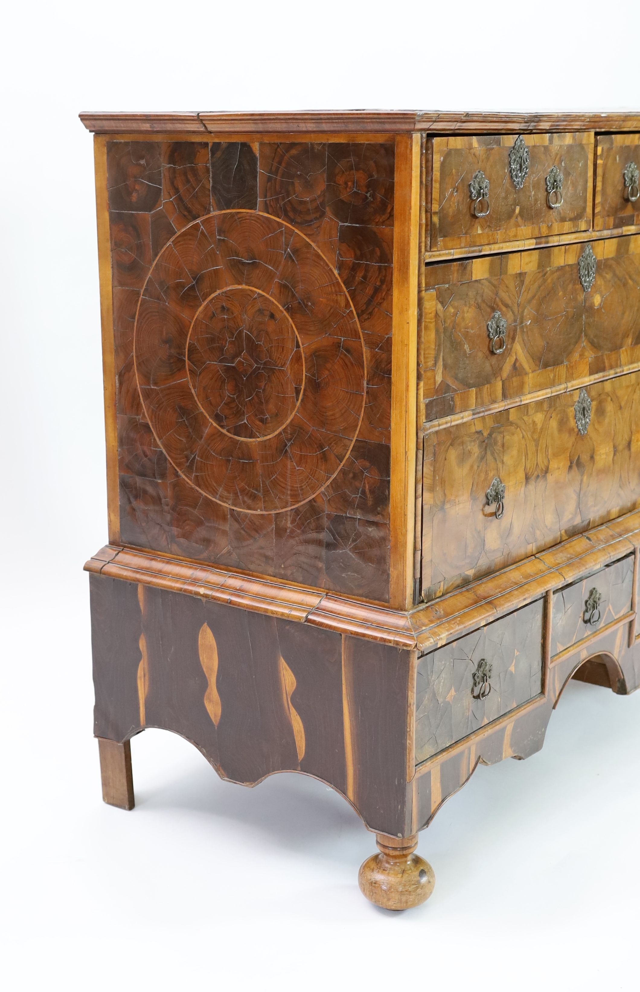 A William and Mary oyster olivewood and kingwood walnut chest on stand, W.97cm D.55cm H.95cm